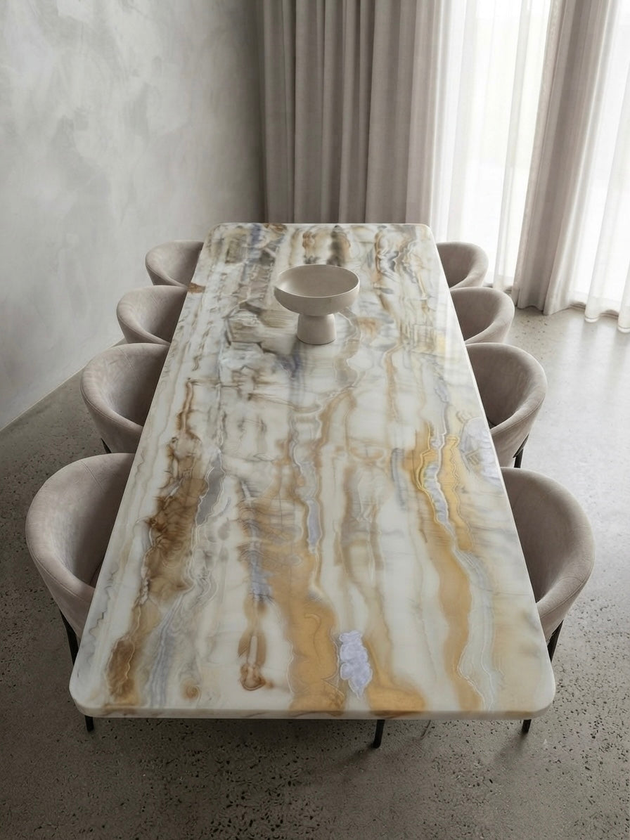 Bespoke white rectangular dining table with silver and gold pouring art.