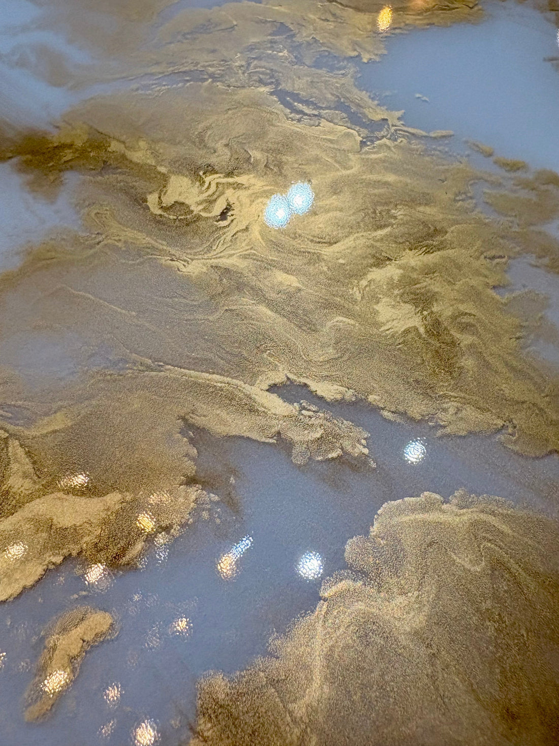 Gold cloud marble design