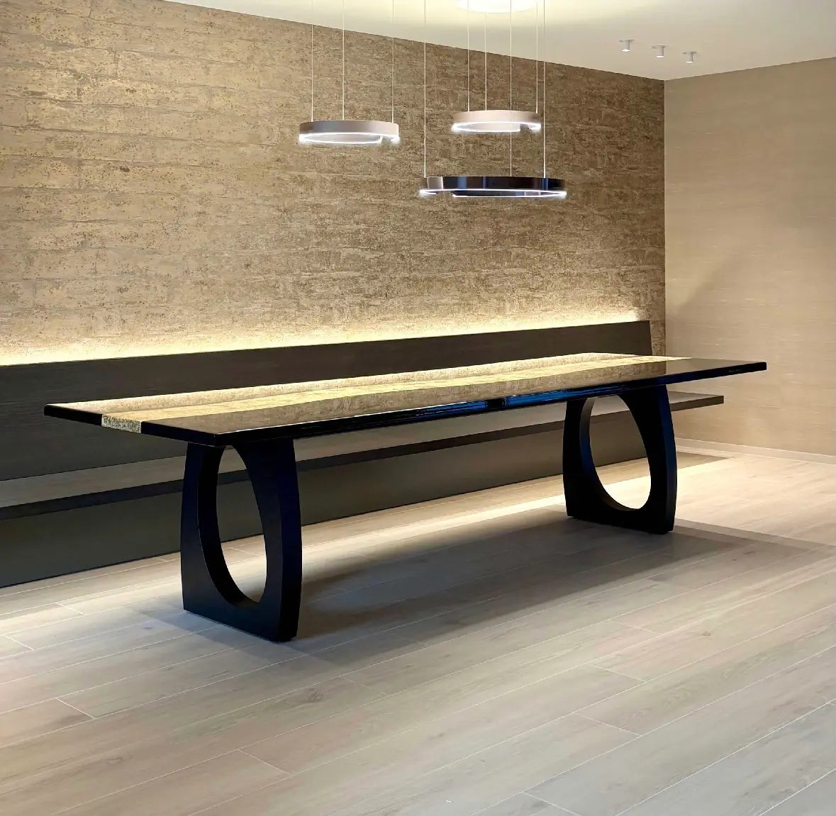 Rectangular black with gold river table in a contemporary interior