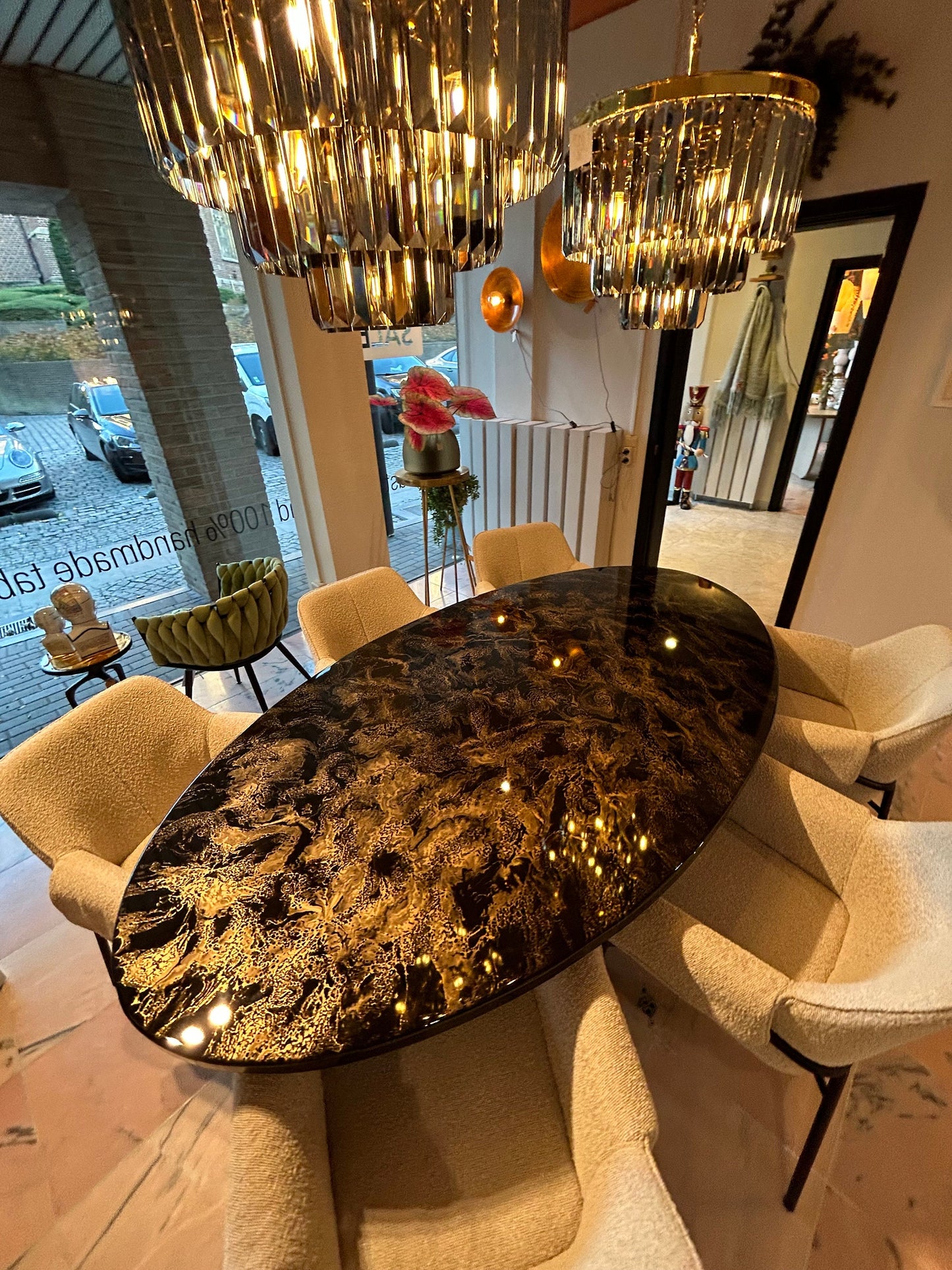 Oval Black and Gold Cloudy Marble Design