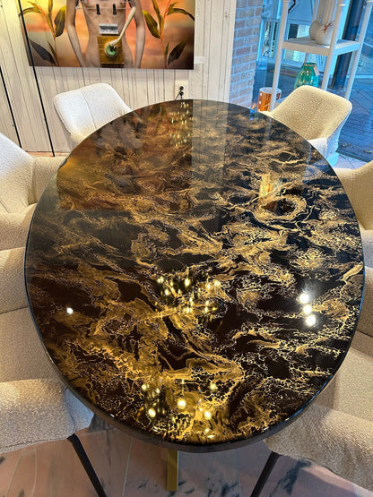 Oval Black and Gold Cloudy Marble Design